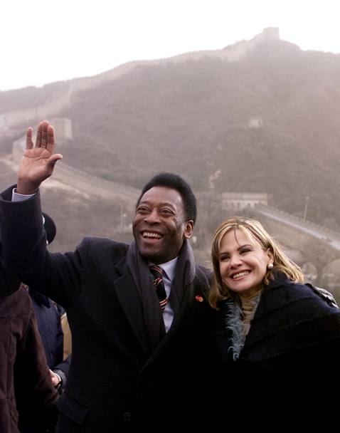 Con la moglie durante un viaggio in Cina (Reuters)